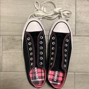 Black converses with pink stitching